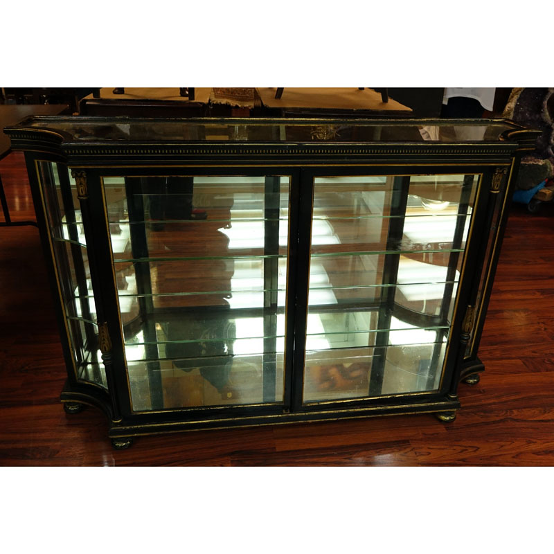 Early to Mid 20th Century English Regency Style Ebonized and Gilt Painted Two Door Credenza with Mirrored Top.