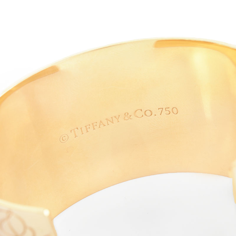 Tiffany & Co 18 Karat Yellow Gold Cuff Notes Bangle Bracelet. Signed, stamped 750.
