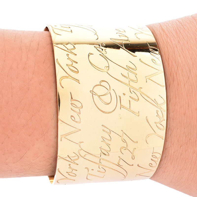 Tiffany & Co 18 Karat Yellow Gold Cuff Notes Bangle Bracelet. Signed, stamped 750.