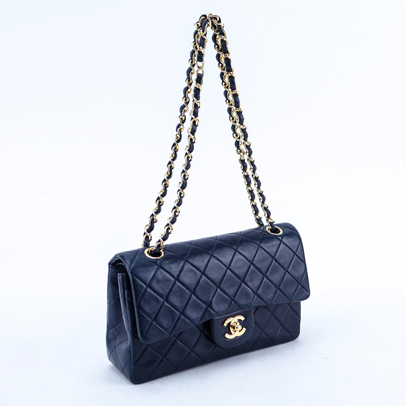 Chanel Navy Blue Quilted Leather Classic Double Flap Bag 23. Gold tone hardware, interior of burgundy leather with patch pockets.