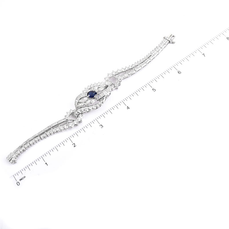 Vintage Approx. 15.0 Carat Round Brilliant, Marquise and Baguette Cut Diamond, 1.50 Oval Cut Sapphire and Platinum Bracelet.