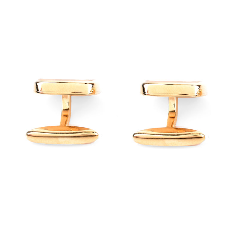 Chopard Approx. .50 Carat Round Brilliant Cut Diamond and 18 Karat Yellow Gold Happy Diamond Cuff Links.