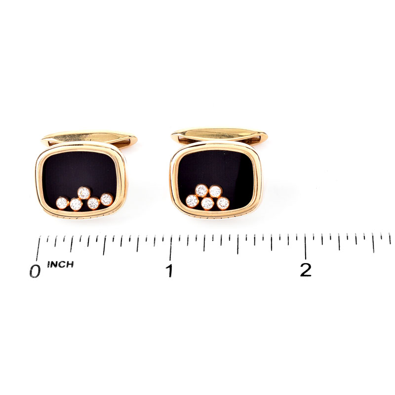 Chopard Approx. .50 Carat Round Brilliant Cut Diamond and 18 Karat Yellow Gold Happy Diamond Cuff Links.