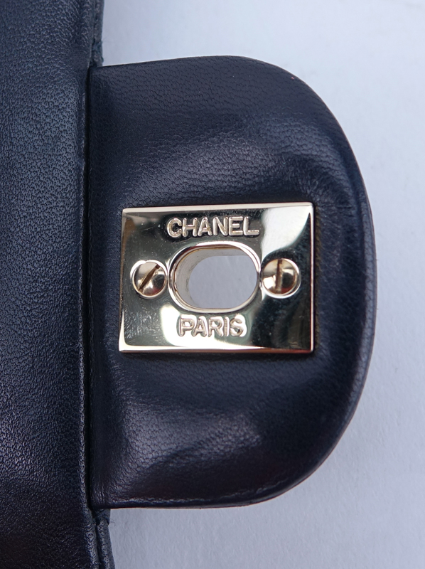 Chanel Black Quilted Leather Classic Double Flap Bag 26. Gold tone hardware.