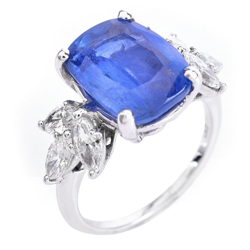 GIA Certified 5.07 Carat Cushion Cut No Heat Burma Sapphire, 1.20 Carat Marquise Cut Diamond and Platinum Ring.