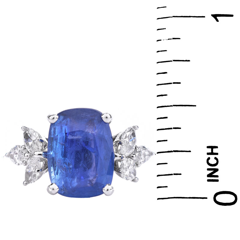 GIA Certified 5.07 Carat Cushion Cut No Heat Burma Sapphire, 1.20 Carat Marquise Cut Diamond and Platinum Ring.