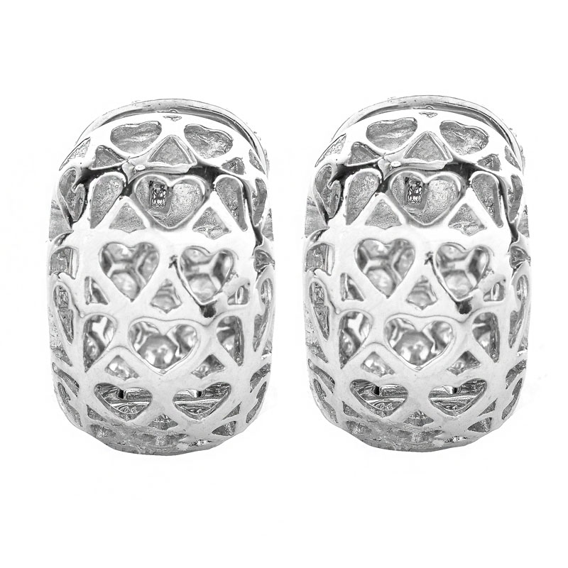 Approx. 2.60 Carat Pave Set Round Brilliant Cut Diamond and Platinum Huggie earrings.