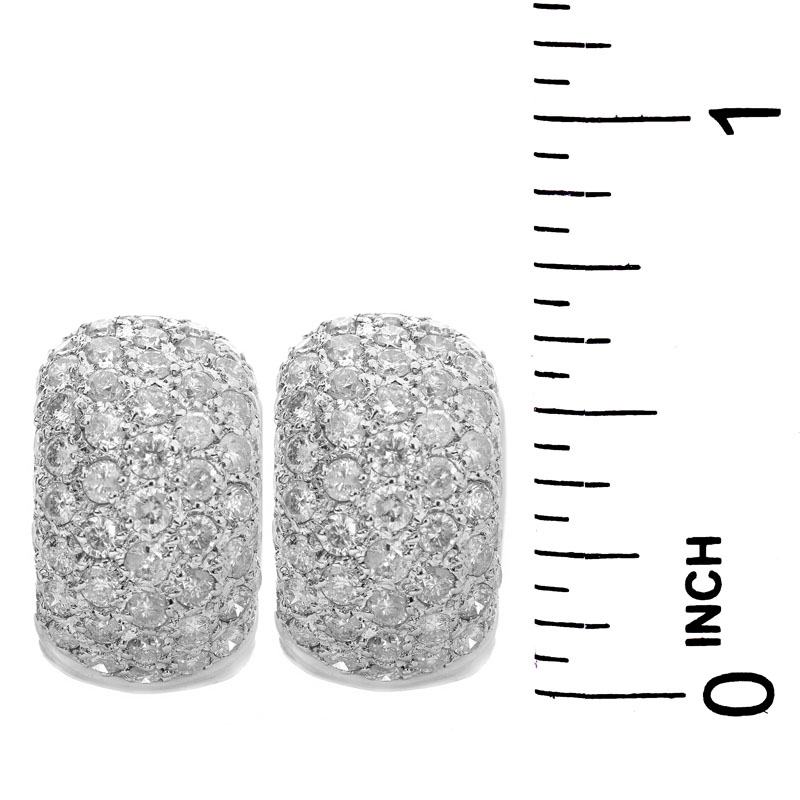 Approx. 2.60 Carat Pave Set Round Brilliant Cut Diamond and Platinum Huggie earrings.