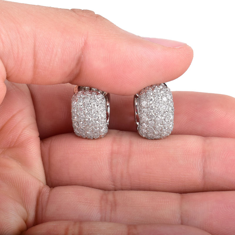 Approx. 2.60 Carat Pave Set Round Brilliant Cut Diamond and Platinum Huggie earrings.