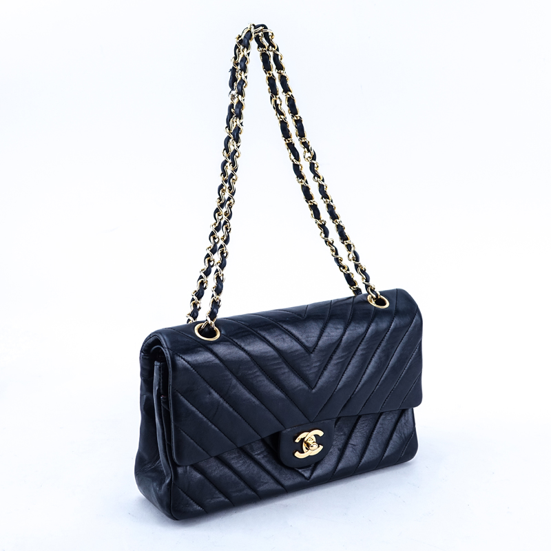 Chanel Black Quilted Chevron Motif Leather Double Flap Bag 23. Gold tone hardware.