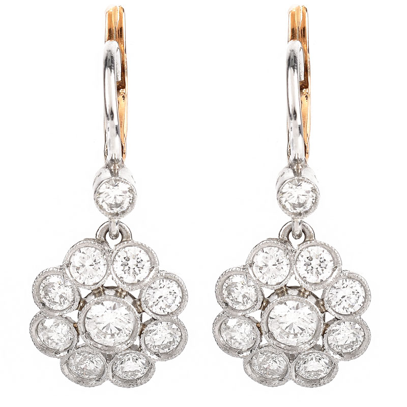 Vintage Approx. 2.04 Carat Round Brilliant Cut Diamond and 14 Karat White and Yellow Gold Dangle Flower Earrings. Diamonds G-H color, VS-SI clarity.