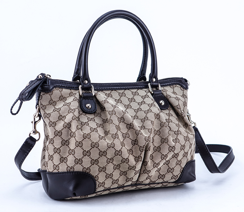 Gucci Beige Monogram Canvas And Leather Sukey PM Bag.