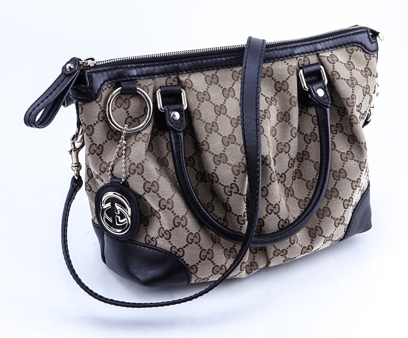 Gucci Beige Monogram Canvas And Leather Sukey PM Bag.