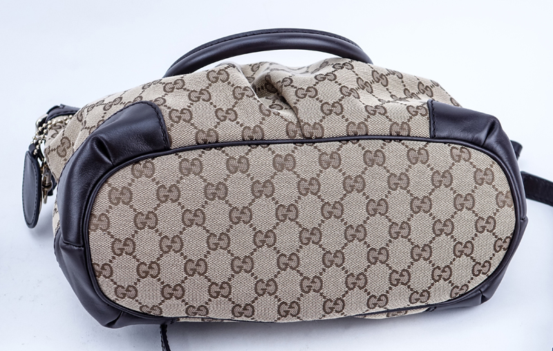 Gucci Beige Monogram Canvas And Leather Sukey PM Bag.