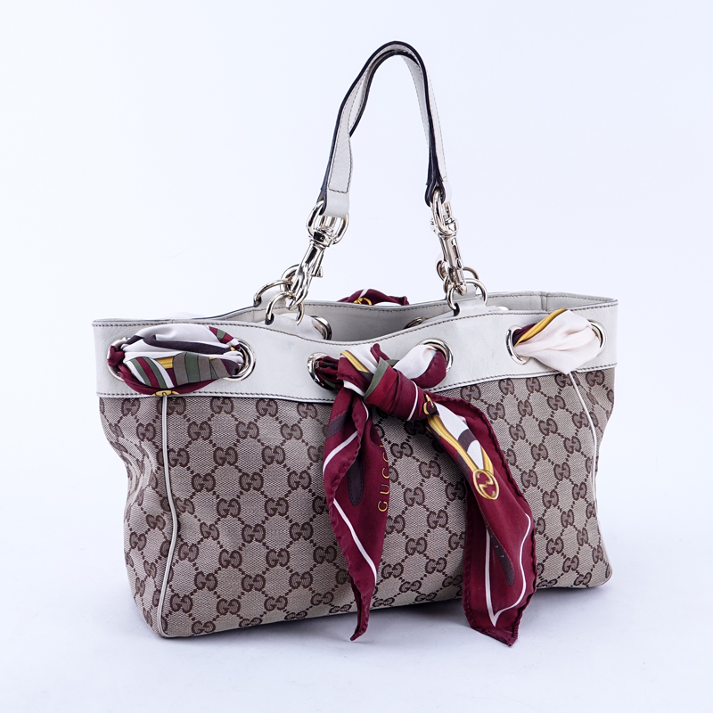 Gucci Beige Supreme Monogram Canvas And Leather Positano PM Tote.