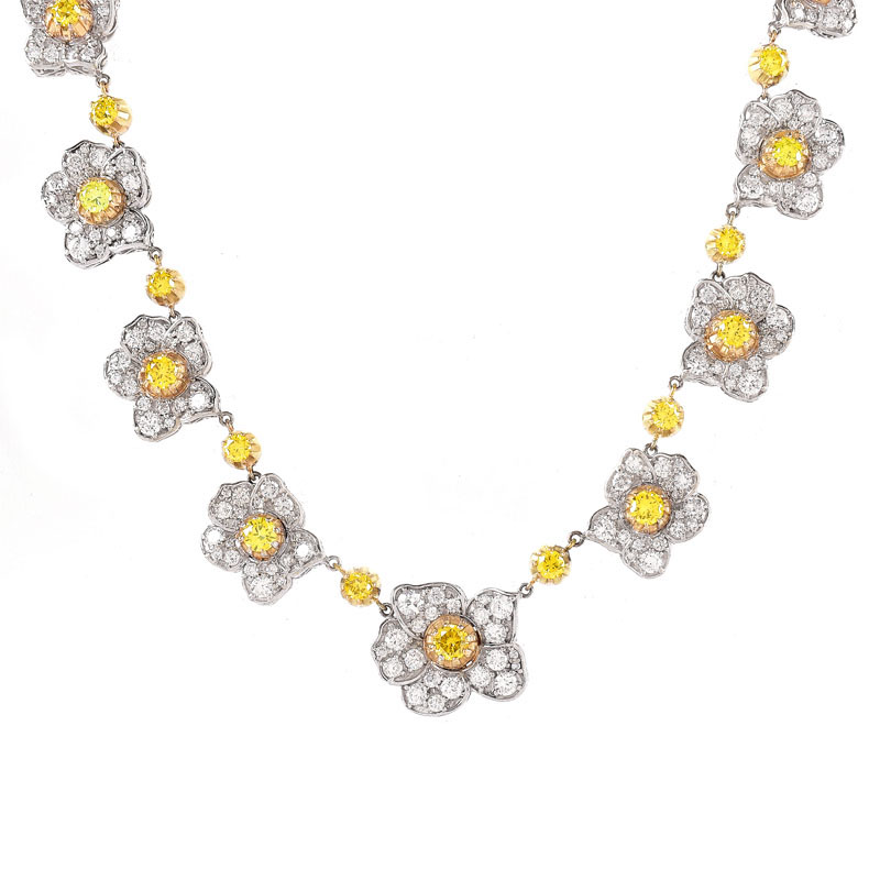 Lady's Vintage Approx. 28.0 Carat TW Round Brilliant Cut Fancy Yellow Diamond,  Pave Set Round Brilliant Cut White Diamond and 18 Karat White Gold Flower Necklace.