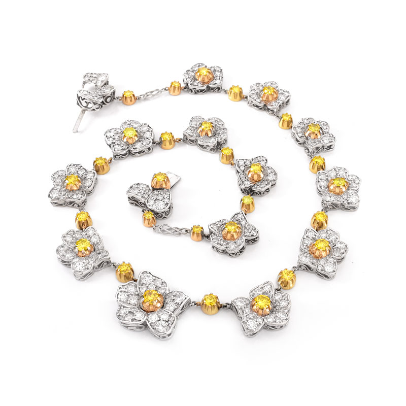 Lady's Vintage Approx. 28.0 Carat TW Round Brilliant Cut Fancy Yellow Diamond,  Pave Set Round Brilliant Cut White Diamond and 18 Karat White Gold Flower Necklace.