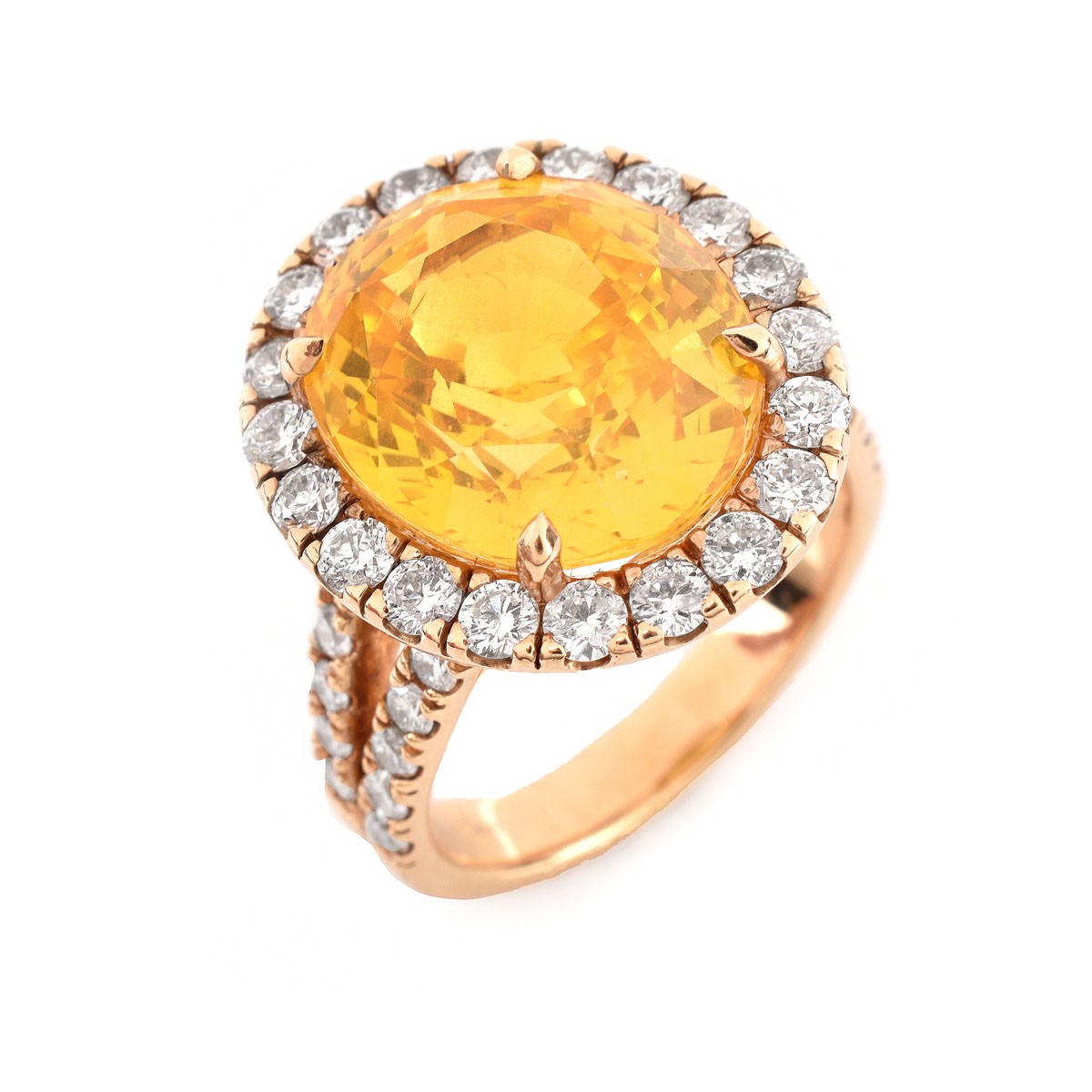 Approx.12.65 Carat Oval Cut Yellow Sapphire, 1.15 Carat Round Brilliant Cut Diamond and 18 Karat Yellow Gold Ring. Sapphire measures 14.58 x 12.36 x 8.43mm.