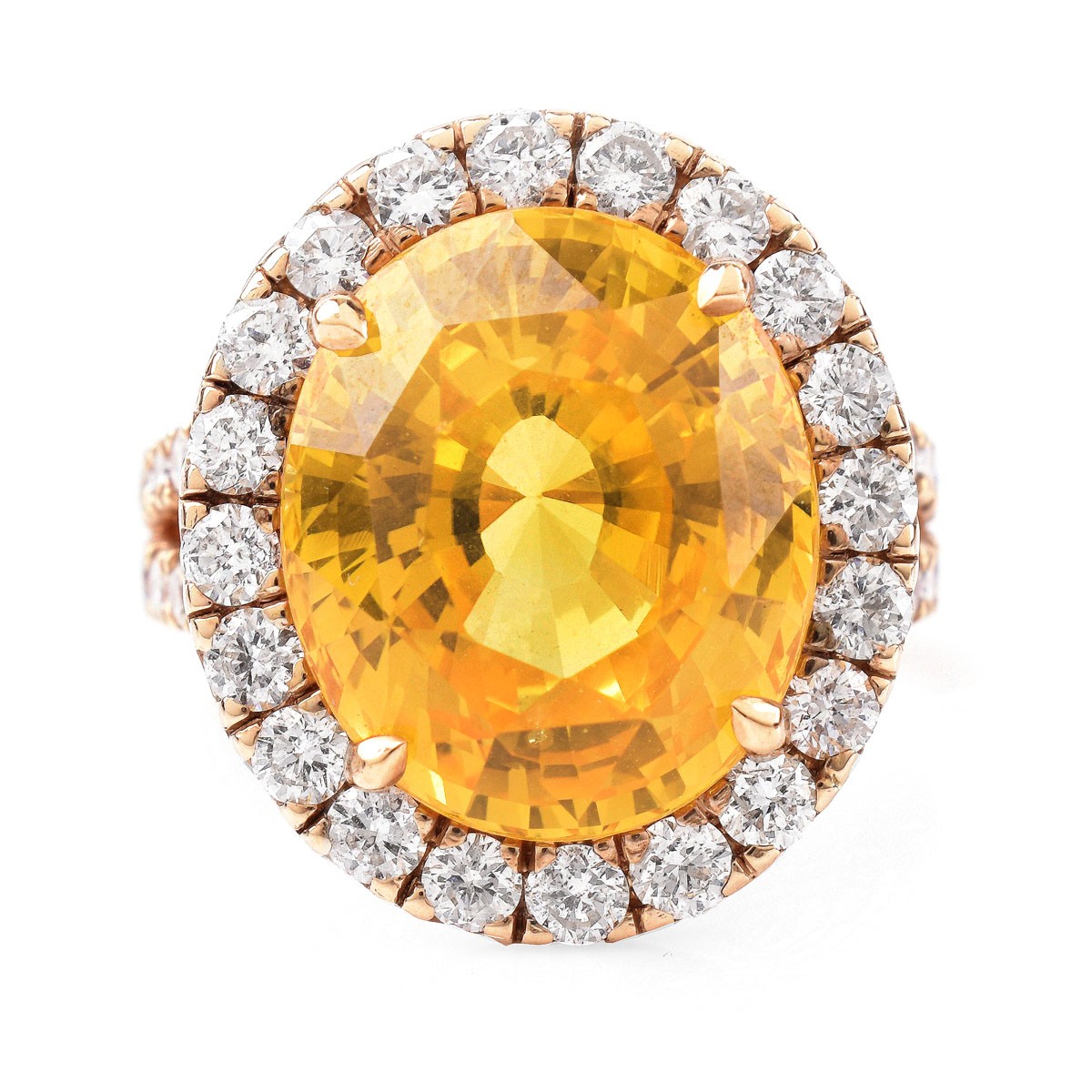 Approx.12.65 Carat Oval Cut Yellow Sapphire, 1.15 Carat Round Brilliant Cut Diamond and 18 Karat Yellow Gold Ring. Sapphire measures 14.58 x 12.36 x 8.43mm.