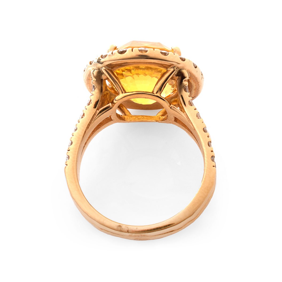 Approx.12.65 Carat Oval Cut Yellow Sapphire, 1.15 Carat Round Brilliant Cut Diamond and 18 Karat Yellow Gold Ring. Sapphire measures 14.58 x 12.36 x 8.43mm.