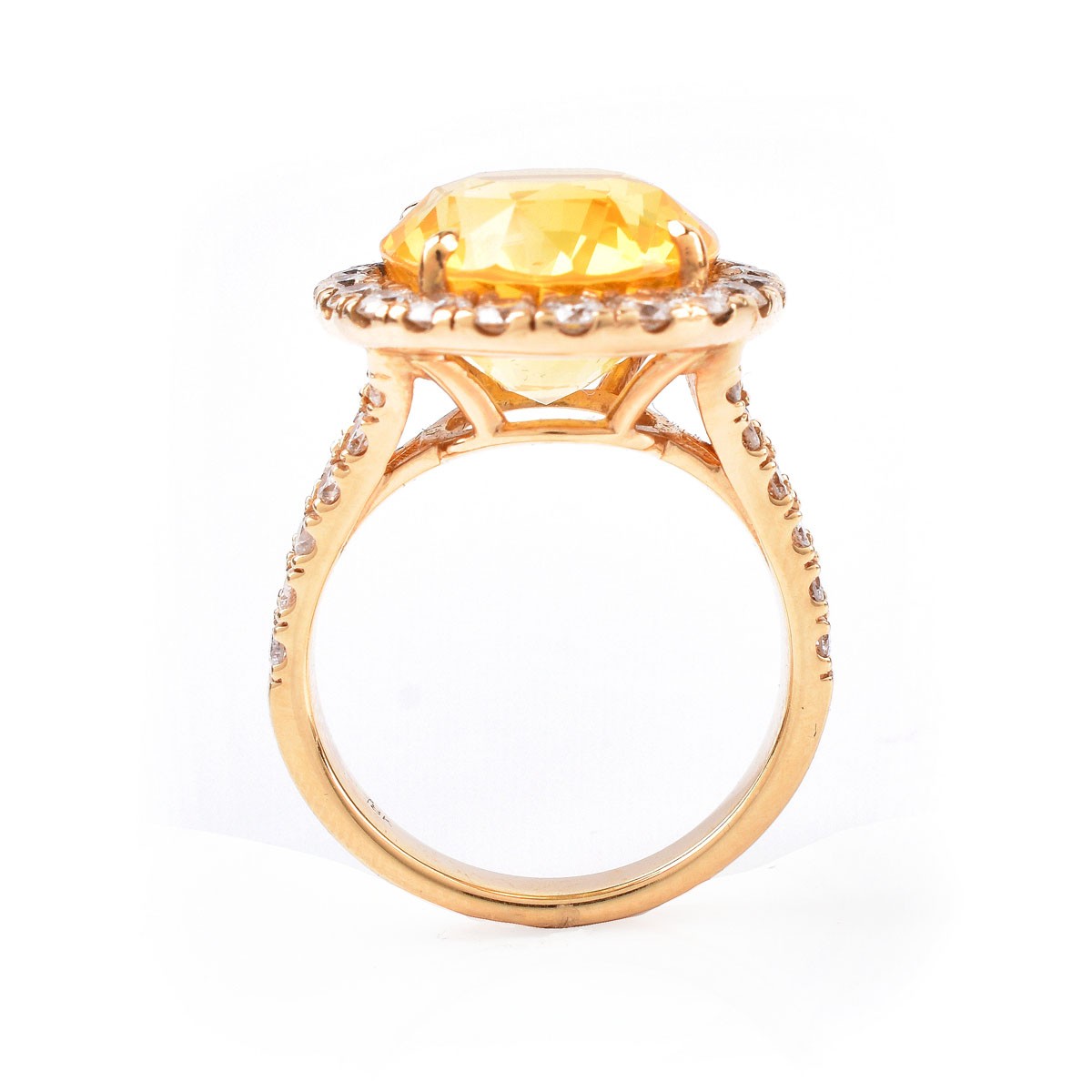 Approx.12.65 Carat Oval Cut Yellow Sapphire, 1.15 Carat Round Brilliant Cut Diamond and 18 Karat Yellow Gold Ring. Sapphire measures 14.58 x 12.36 x 8.43mm.