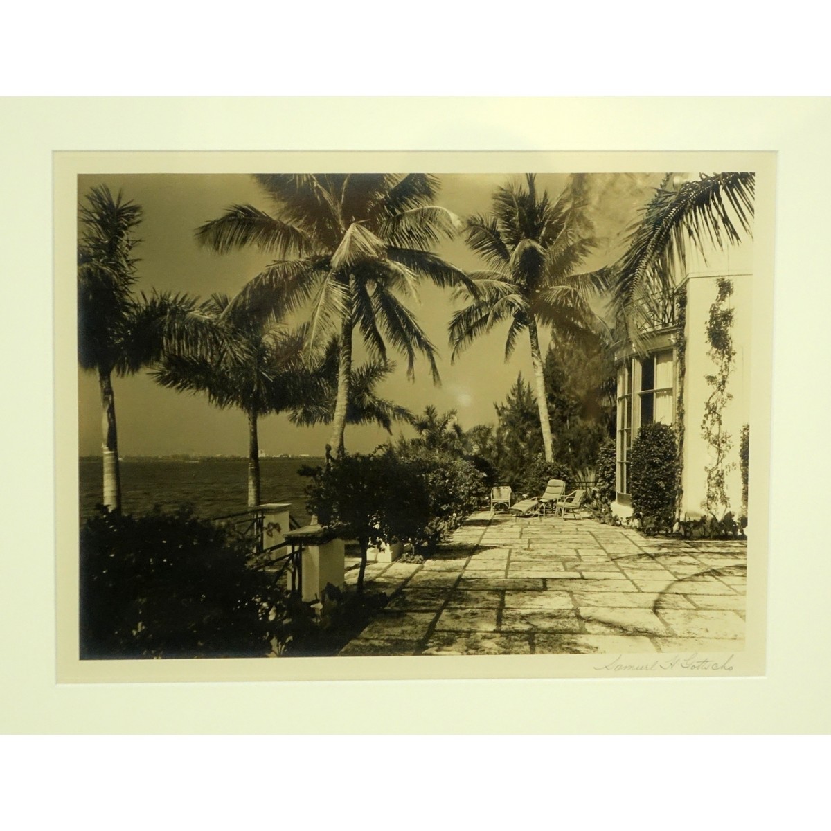 Two (2) Works by Samuel Gottscho, American (1875 - 1971) Black and White Silver Gelatin Prints of Two Courtyard Scenes, Each Signed Lower Right. Good condition.