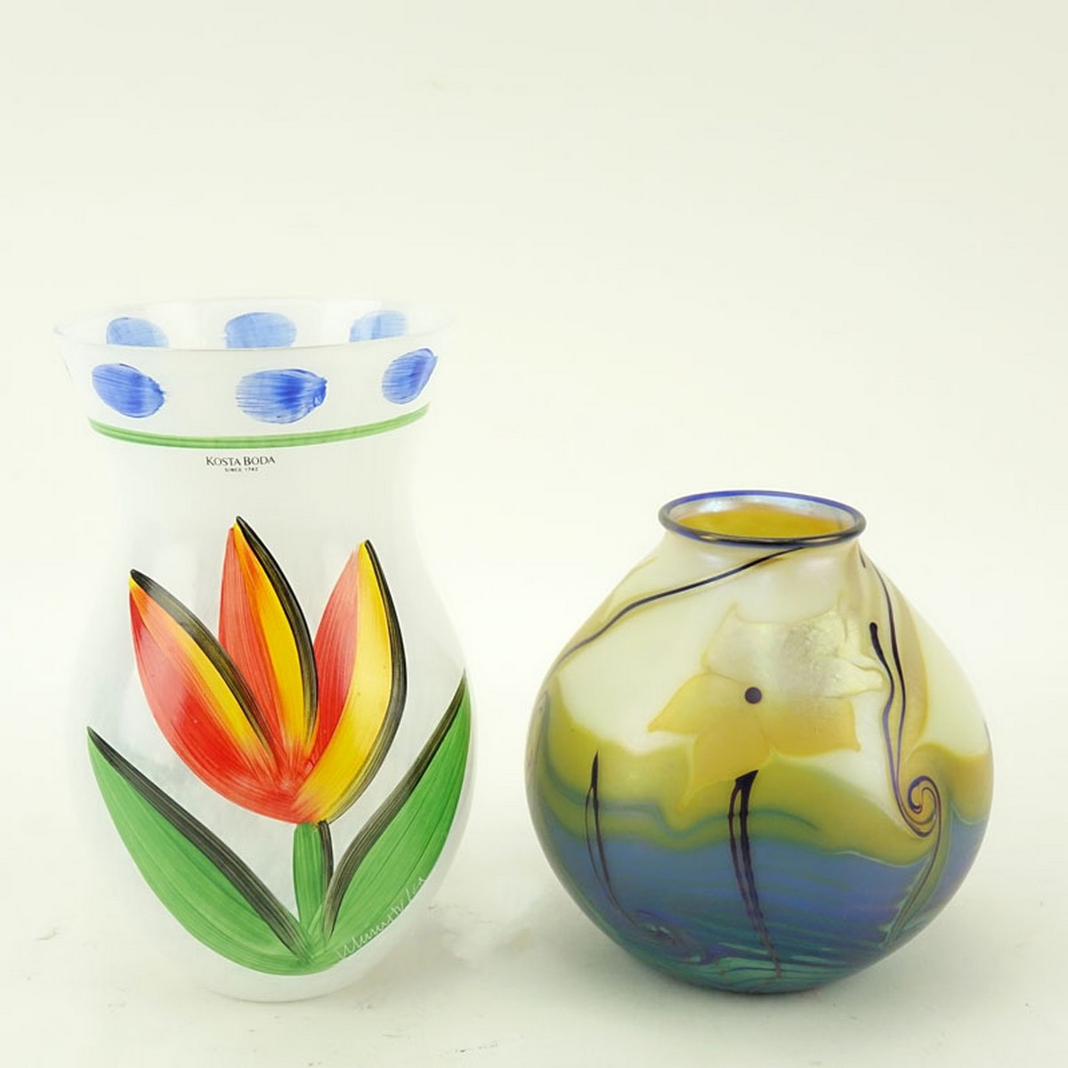 Grouping of Two (2): Kosta Boda Tulipa Vase, Orient and Flume Art Glass Vase. Each appropriately signed, Kosta Boda has original sticker attached.