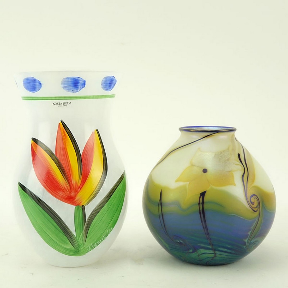 Grouping of Two (2): Kosta Boda Tulipa Vase, Orient and Flume Art Glass Vase. Each appropriately signed, Kosta Boda has original sticker attached.