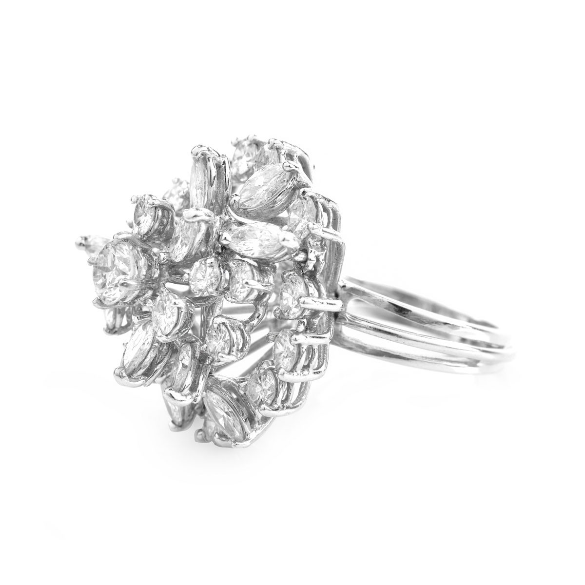 Vintage Approx. 5.0 Carat Marquise and Round Brilliant Cut Diamond and Platinum Cluster Ring.