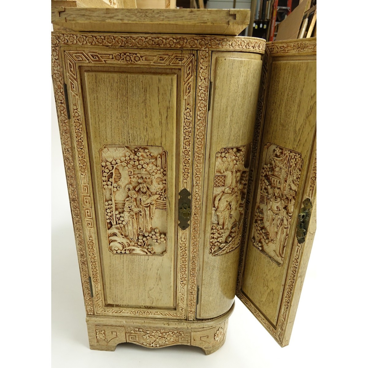 Vintage Chinese Motif Carved Wood Liquor Cabinet. Top lifts to reveal busy carved scene and fold out panels for serving.