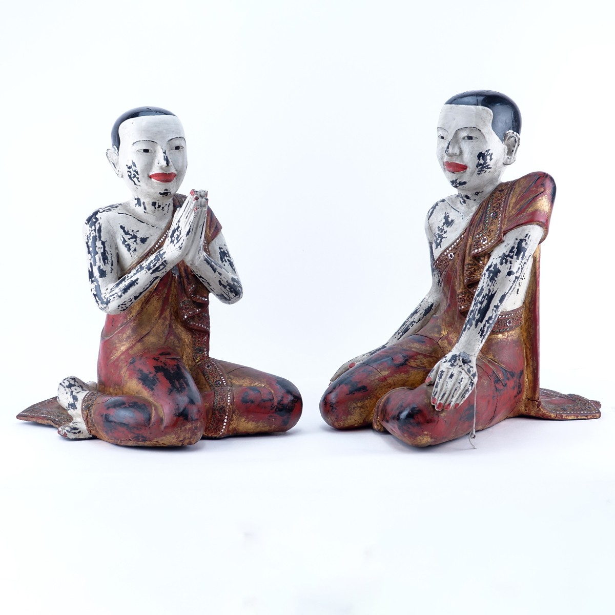 Pair of Large Burmese Polychrome Wood and Glass Beaded Buddhist Sculptures. Typical age splits, rubbing throughout, missing glass.