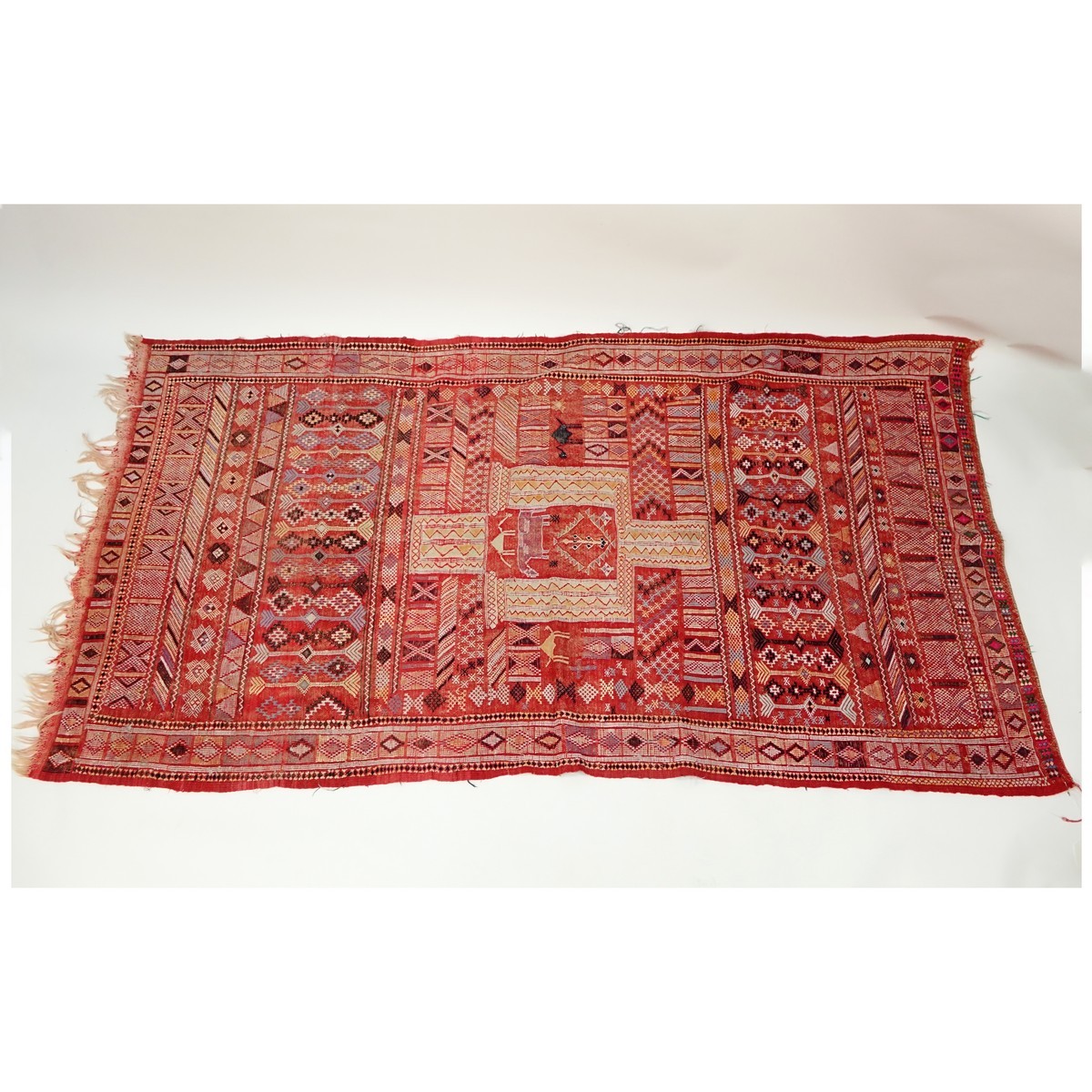 Semi Antique Moroccan Hand Knotted Tribal Rug. Wear to fringes, normal discoloration.