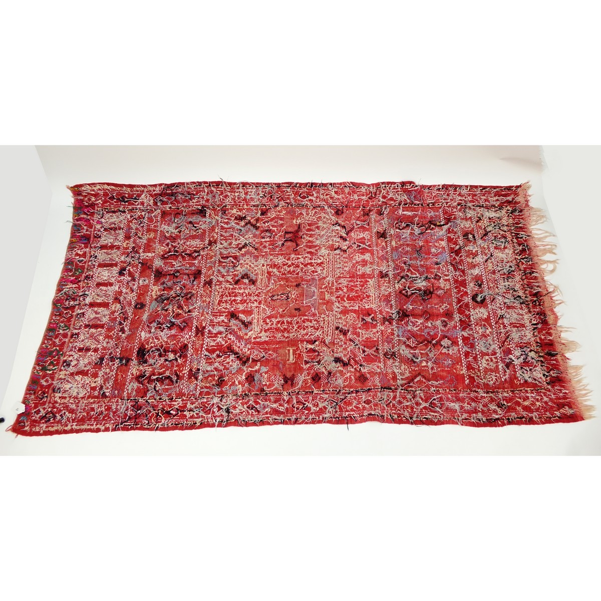 Semi Antique Moroccan Hand Knotted Tribal Rug. Wear to fringes, normal discoloration.