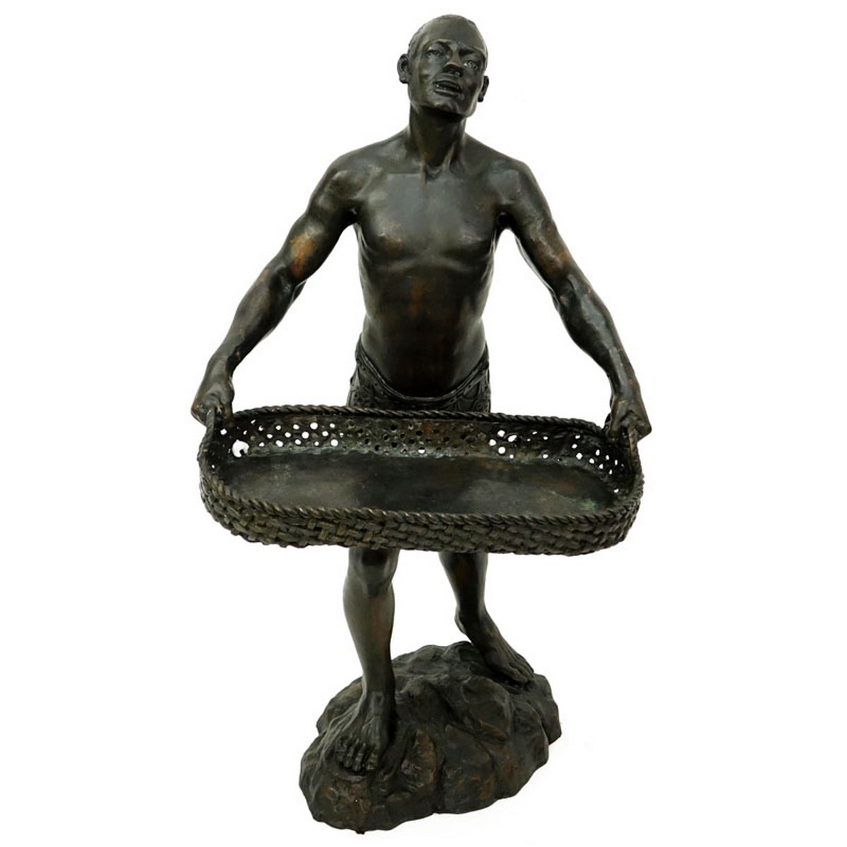 A Patinated Bronze Sculpture, Nubian Male Carrying Basket, Unsigned. Rubbing to surface overall good condition.