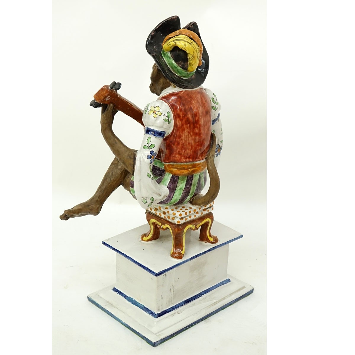 Italian Faience Pottery Figurine, Monkey Musical Player. Signed and numbered to base.