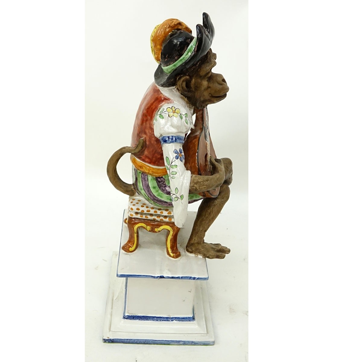 Italian Faience Pottery Figurine, Monkey Musical Player. Signed and numbered to base.