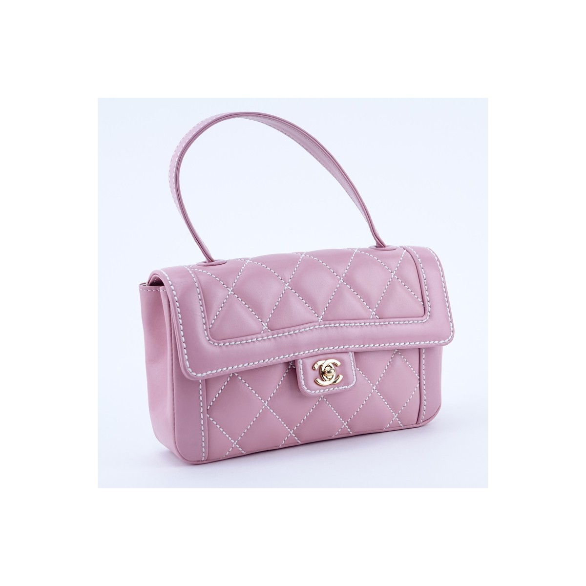 Chanel Light Pink Thick Quilted Leather Top Handle Rectangular Bag. Gold tone hardware, the interior of white monogram fabric with zippered and patch pockets.