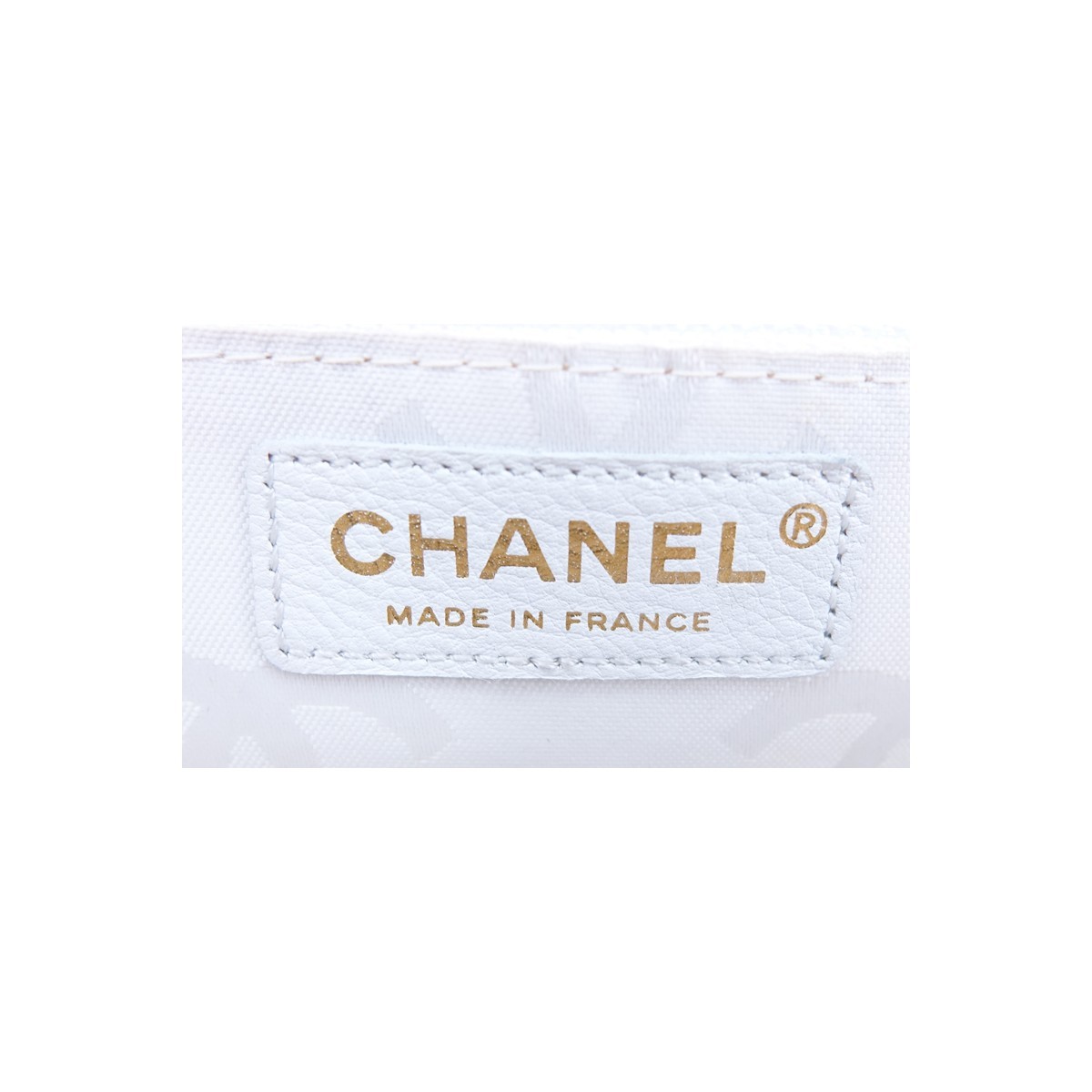 Chanel Light Pink Thick Quilted Leather Top Handle Rectangular Bag. Gold tone hardware, the interior of white monogram fabric with zippered and patch pockets.