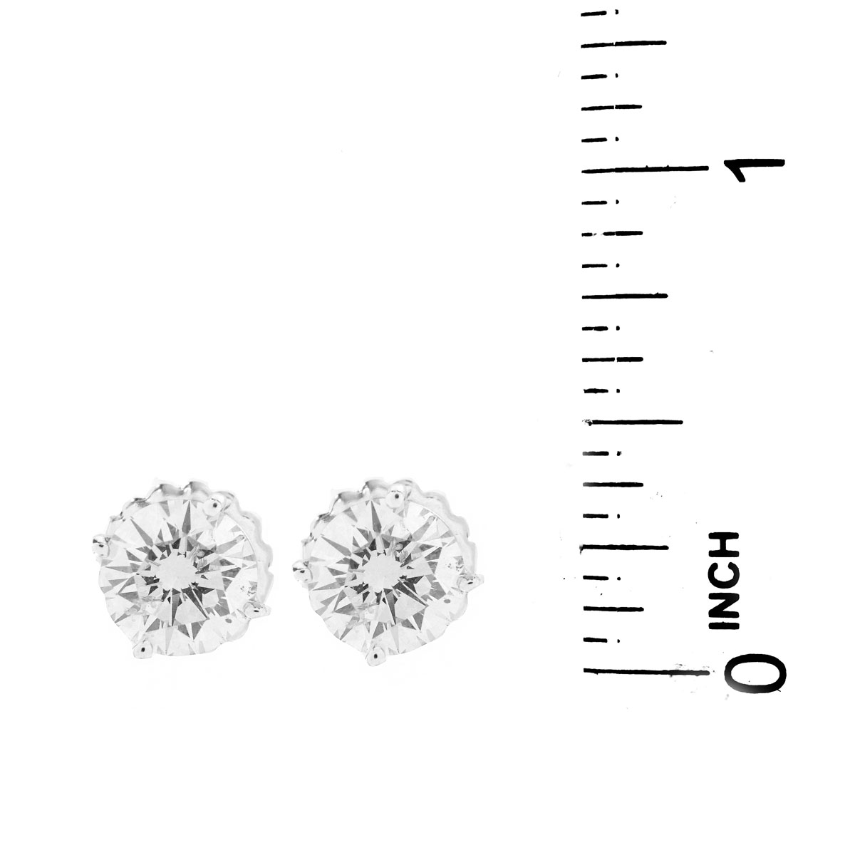 Approx. 3.52 Carat TW Round Brilliant Cut Diamond and 14 Karat White Gold Ear Stud.