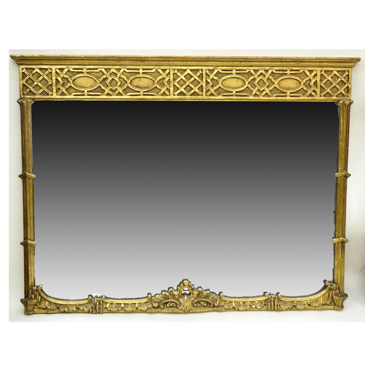 Antique Style Italian Giltwood Carved Mirror. Rubbing to gilt, scuffs and scratches to frame.
