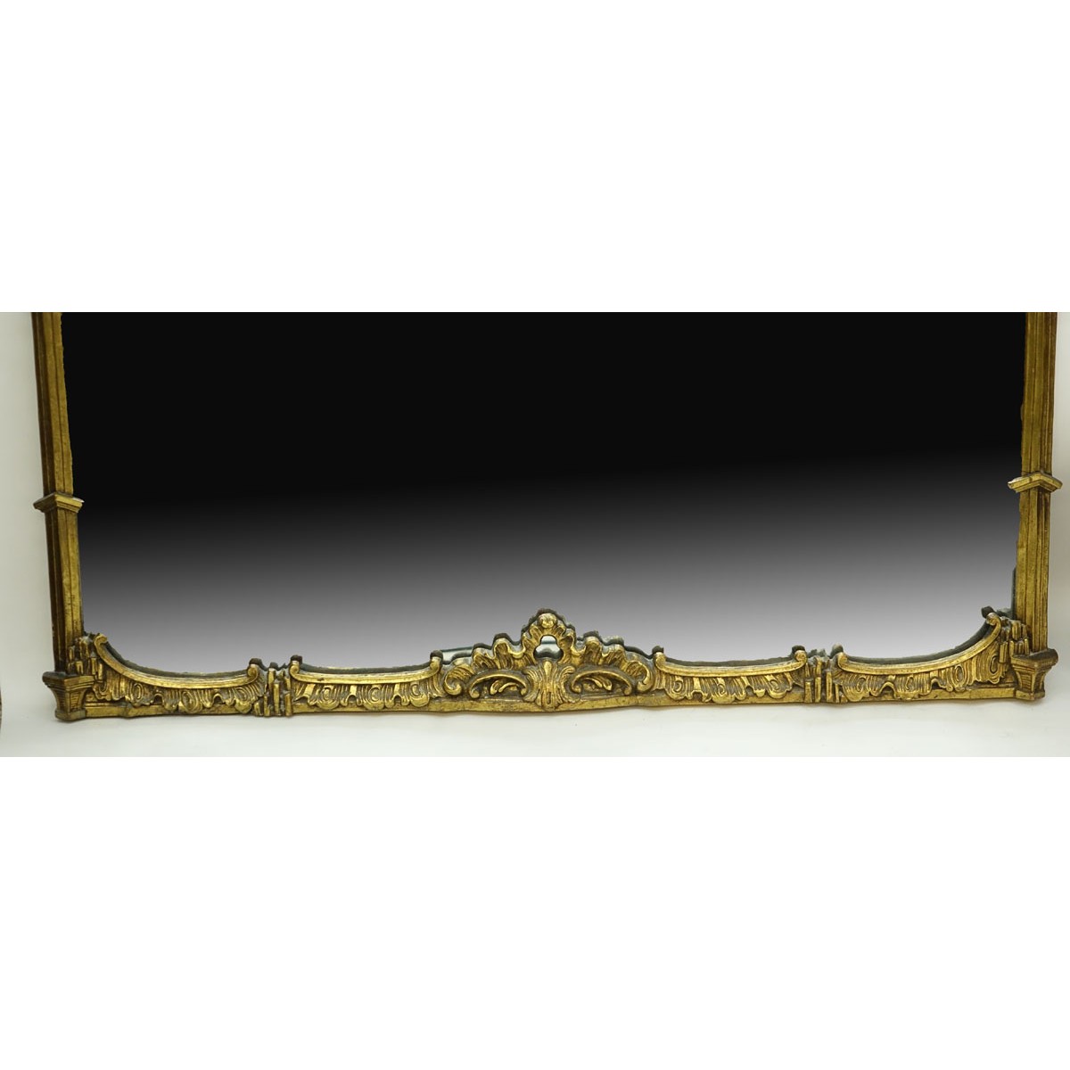 Antique Style Italian Giltwood Carved Mirror. Rubbing to gilt, scuffs and scratches to frame.