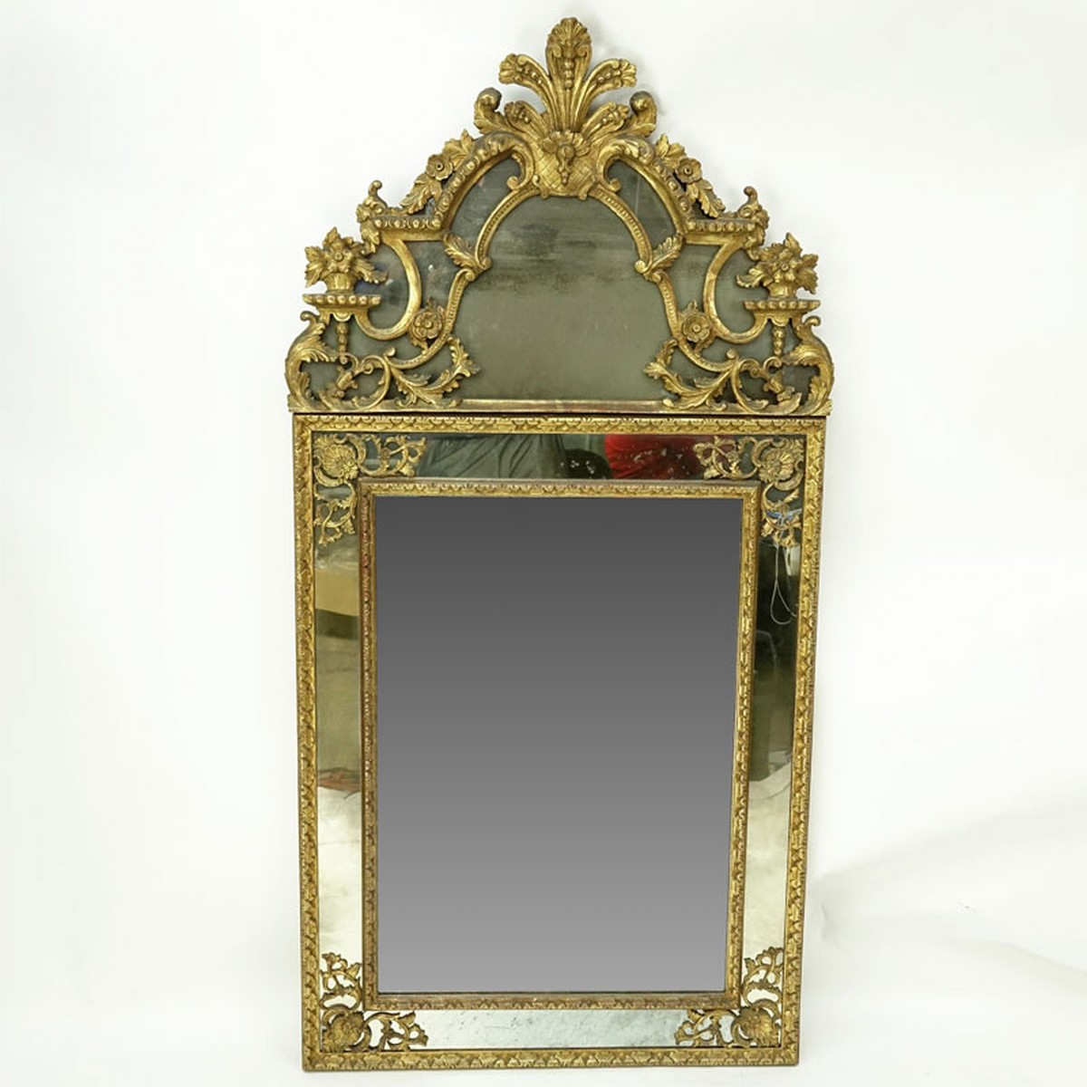 Antique French Régence Style Giltwood Carved Mirror. Ornate floral and scroll foliage to frame.