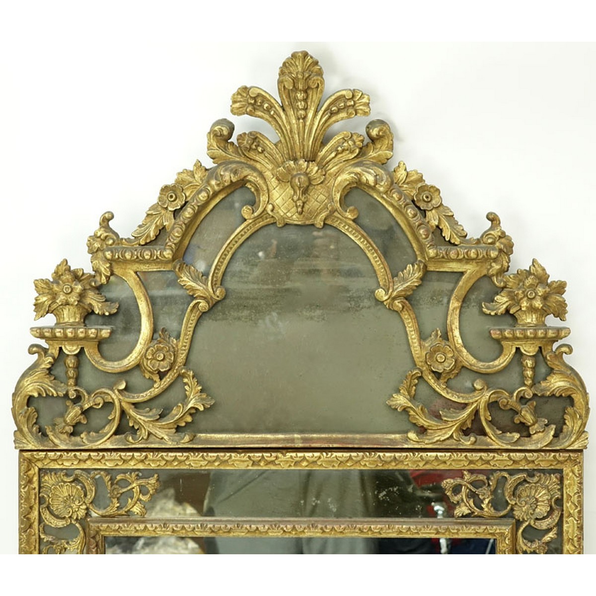 Antique French Régence Style Giltwood Carved Mirror. Ornate floral and scroll foliage to frame.