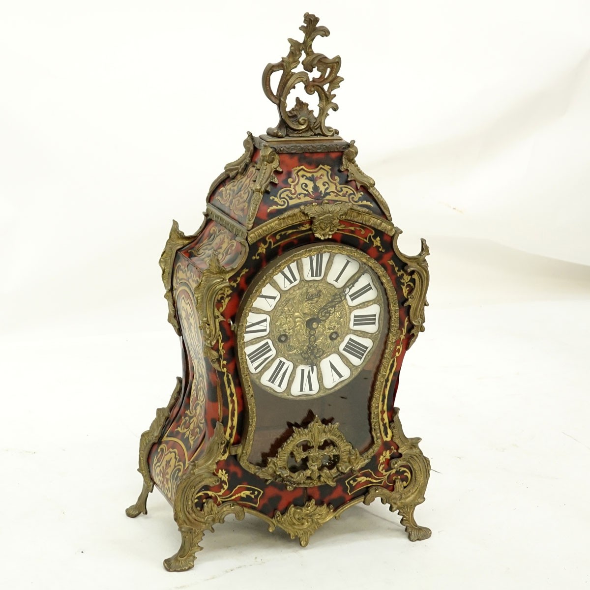 Modern French Boulle Style Gilt Brass Mounted Bracket Clock. Enameled mounted dial with Roman numerals, key and pendulum included.