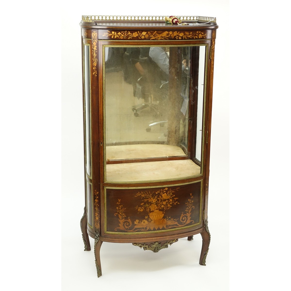 Tall Mid Century French Louis XVI Style Inlaid, Gilt Brass Mounted Vitrine. Floral inlay throughput the panel and top apron, gallery, stands on curved tapering legs, key included.