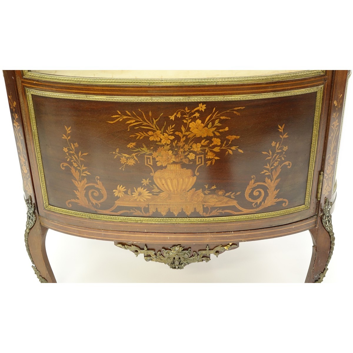 Tall Mid Century French Louis XVI Style Inlaid, Gilt Brass Mounted Vitrine. Floral inlay throughput the panel and top apron, gallery, stands on curved tapering legs, key included.