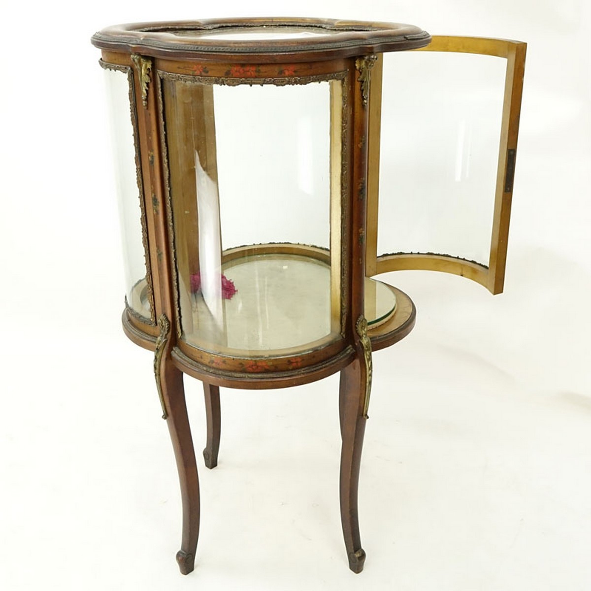 20th Century French Gilt and Floral Painted Vitrine with Brass Fittings. Two large curved fitted doors with single glass shelve, key included.