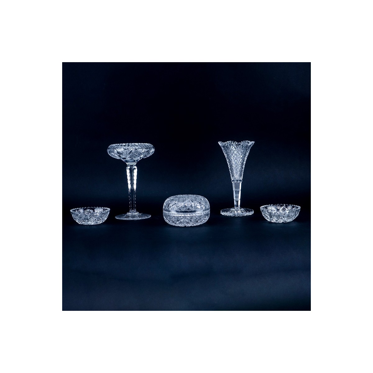 Grouping of Five (5) Cut Crystal Tableware. Includes: compote, vase, covered box, and 2 open bowls.