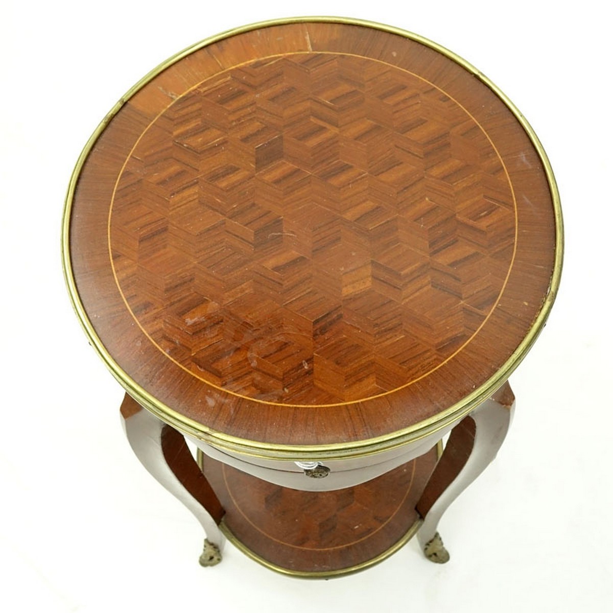 20th Century French Louis XVI Style Parquetry Inlaid Gilt Brass Round Side Table. Single fitted sliding drawer with shelf stretcher.