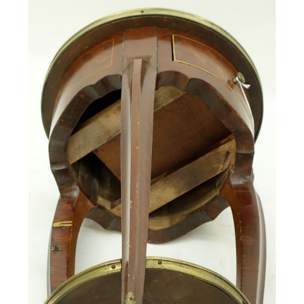 20th Century French Louis XVI Style Parquetry Inlaid Gilt Brass Round Side Table. Single fitted sliding drawer with shelf stretcher.